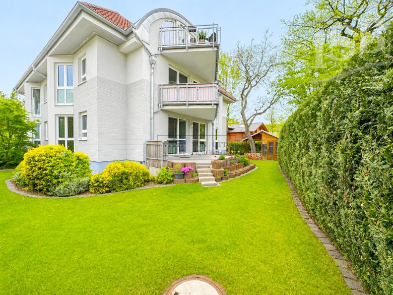 Haus in Haus: 4 Zi.-Maisonettewohnung mit sonnigem Garten und Garage
